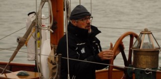 Prizes Galore For Jap As British Classic Week Ends in Torrents image of TV comedian Griff Rhys Jones helming his yacht