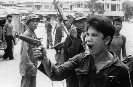 image of Racial hatred? Sophie's uncle was nine years old when they shot him. Vietnam 1975 Khmer Rouge Soldiers (AP Photo/Christoph Froehder)