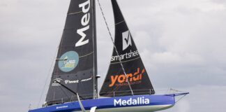 Fastnet 2023 – British Ocean Sailor Pip Hare names co-skipper Medallia-Pip Hare's refitted IMOCA Open60 race yacht. Credit Lloyd images