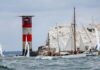 Round the Island Race 2023 – Volvo 70 Tschuss 2 Copyright Paul Wyeth Yachts round the Needles lighthouse